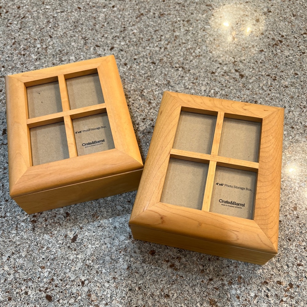 TWO Crate and Barrel Photo boxes with photo frame on top of box